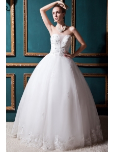 Luxurious Ball Gown Strapless Floor-length Tulle Beading Wedding Dress