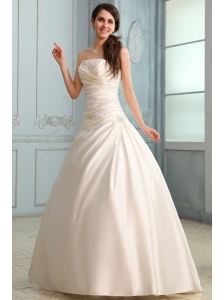 A-Line Strapless Floor-length Beading Lace Up Wedding Dress in Champagne