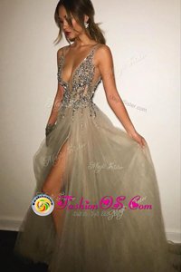 Modest Champagne Prom Gown Tulle Sweep Train Sleeveless Beading