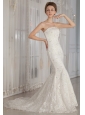 Luxurious Trumpet / Mermaid Strapless Court Train Lace Beading Wedding Dress
